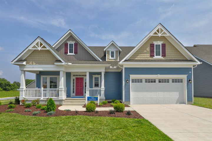 The Lloyd at 501 Jenny Street: craftsman-style home with gabled porch and two-car garage